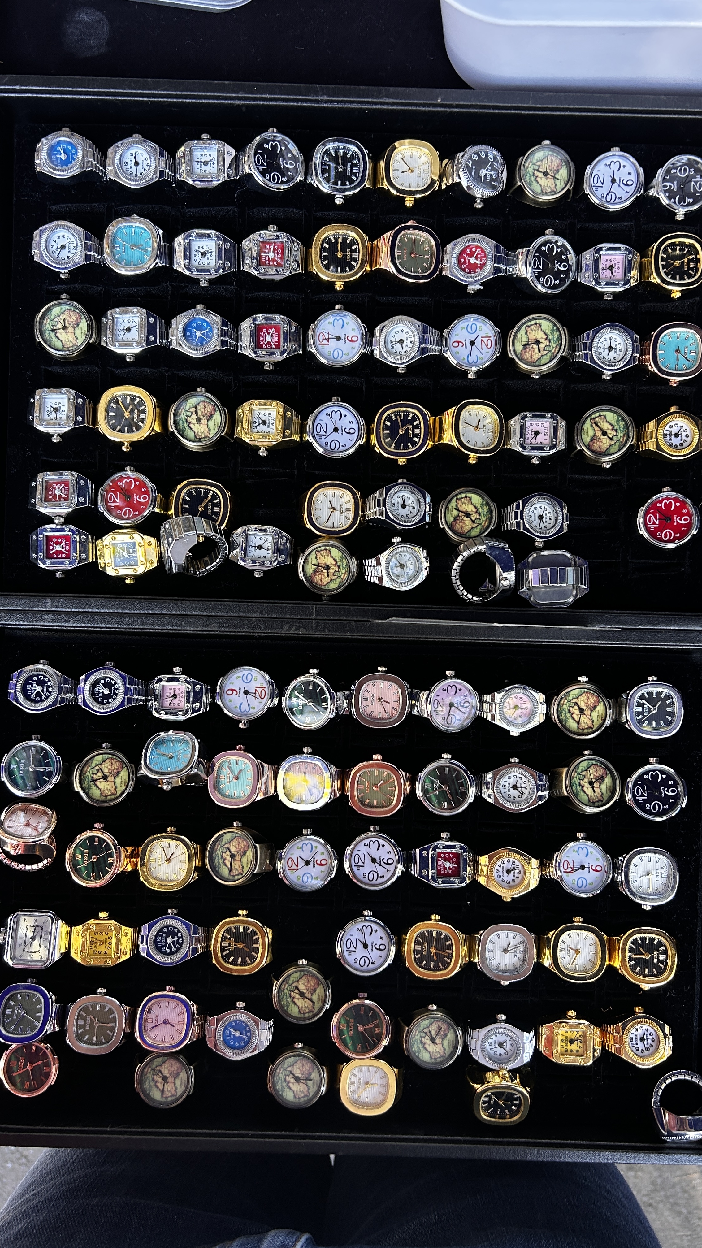 A large selection of retro-style watches in gold and silver finishes.